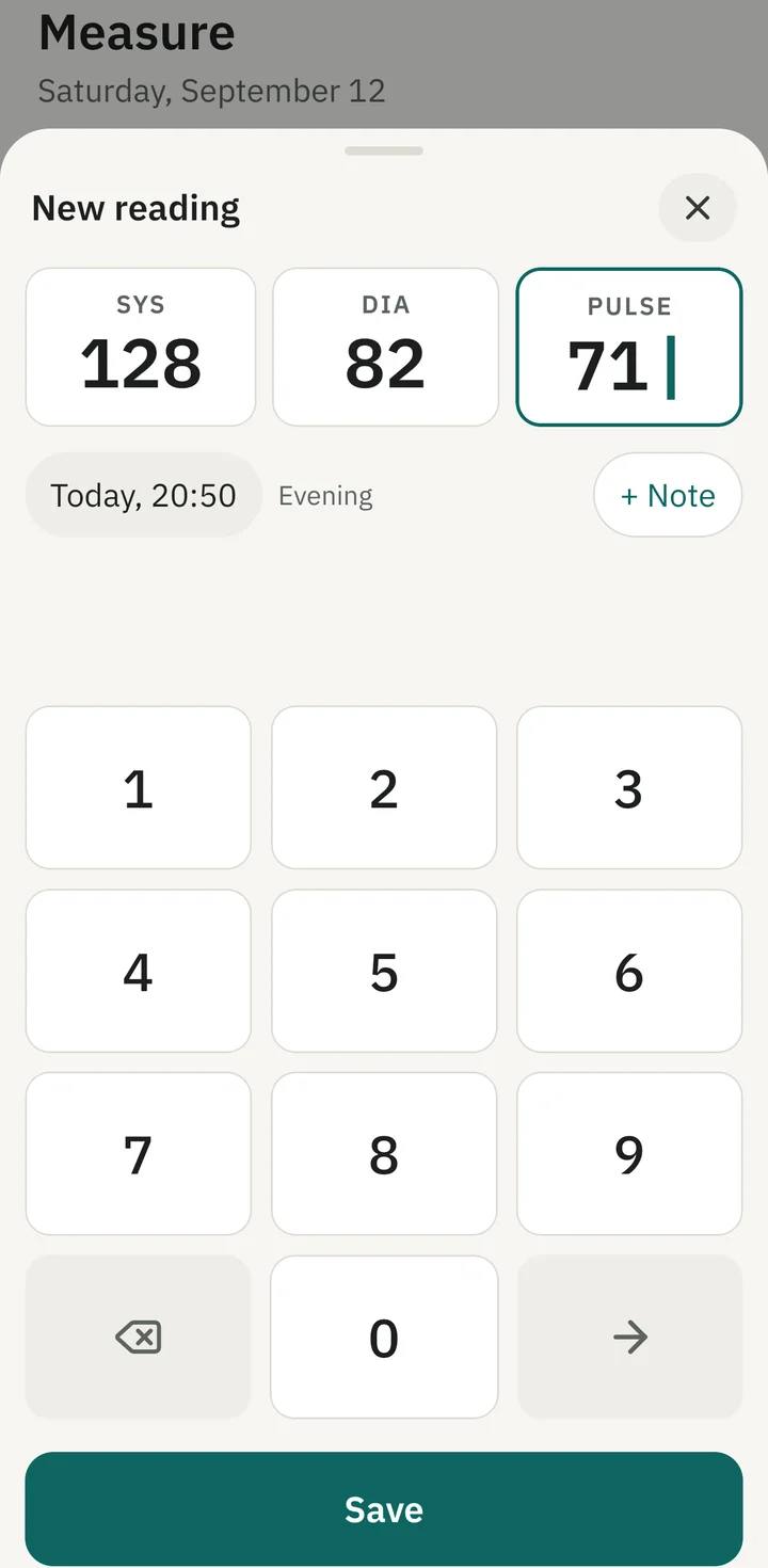 The Tensio entry sheet: 128 systolic, 82 diastolic, pulse 71, today at 20:50 in the evening, above a keypad with large keys.